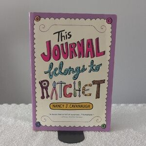 Purple Journal with Colorful Text